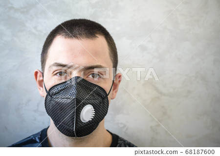 Sick old man with medical face mask portrait close 68187600