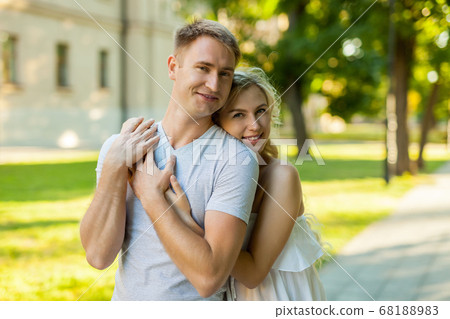 Portrait of beautiful young loving couple smiling Portrait of beautiful young loving couple smiling 68188983