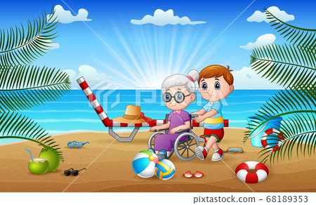 Happy boy with his grandmother on the beach 68189353