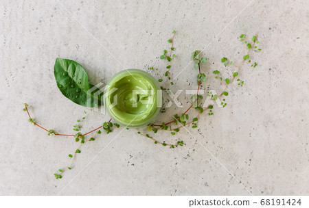 Clay mask in jar on table 68191424