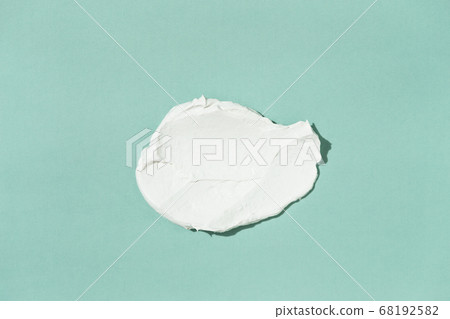 Smear of white clay face mask. 68192582