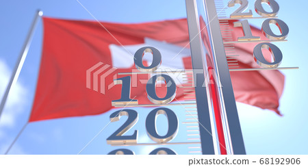 Thermometer shows 0 zero air temperature near waving flag of Switzerland. Weather forecast conceptual 3D rendering Thermometer shows 0 zero air temperature near waving flag of Switzerland. Weather forecast conceptual 3D rendering 68192906