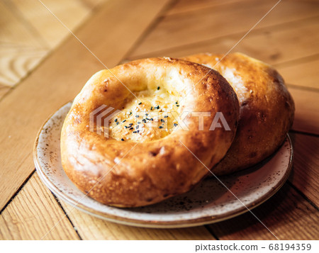 fresh eastern tandoor bread with black sesame seed 68194359