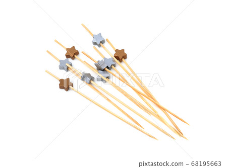 Cocktail picks isolated on white background Cocktail picks isolated on white background 68195663