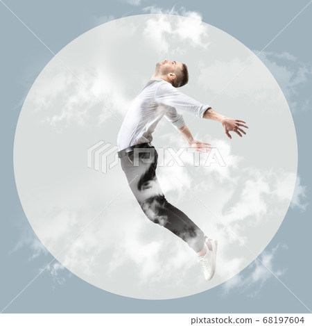 Mid-air beauty. Full length studio shot of attractive young man hovering in air and keeping eyes closed 68197604