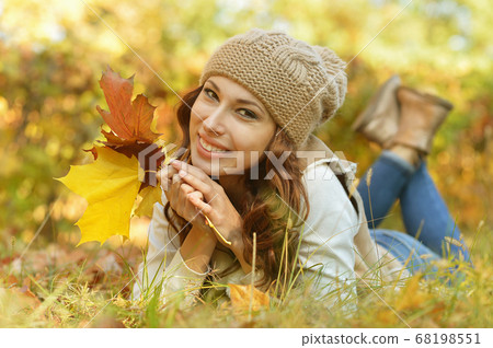 Close-up portrait of beautiful young woman posing Close-up portrait of beautiful young woman posing 68198551