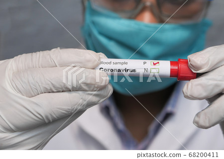 laboratory technician hand holding blood test tube laboratory technician hand holding blood test tube 68200411