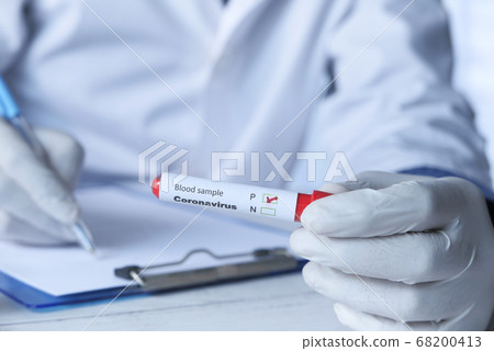 laboratory technician hand holding blood test tube laboratory technician hand holding blood test tube 68200413