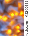 Background from blurry light lights of fir-tree garland on dark. Copy space 68200686