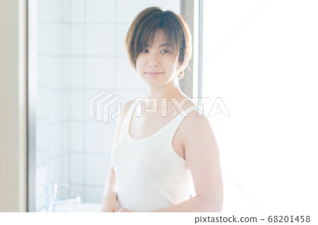 Morning beauty a woman in her 30's who wakes up Morning beauty a woman in her 30's who wakes up 68201458