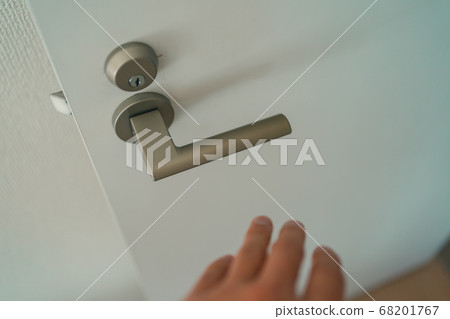 Door knob and hand Door knob and hand 68201767