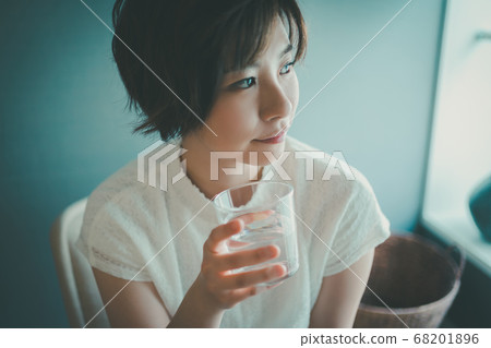 Alasar girls drinking a glass of water Alasar girls drinking a glass of water 68201896