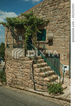 Old stone house with staircase leading to a porch in Monsanto Old stone house with staircase leading to a porch in Monsanto 68202093
