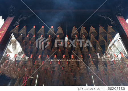 Ho Chi Minh City, Vietnam: spiral incense sticks hang from the ceiling in Thien Hau Pagoda. Thien Hau Pagoda is one of the highlights of Cho Lon, Saigon Chinatown. 68202180