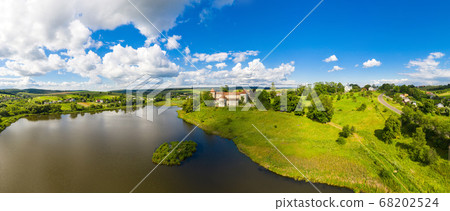 Svirzh castle in Lviv region Ukraine aerial panorama view. 68202524