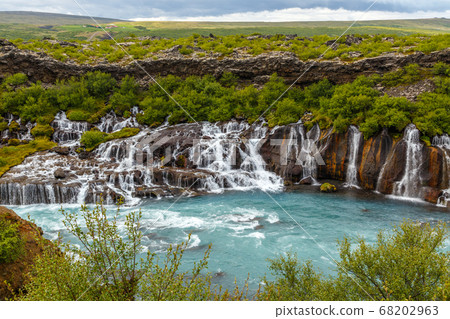 Hraunfossar waterfall powerful streams falling Hraunfossar waterfall powerful streams falling 68202963