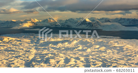 Greenlandic ice cap with wrozen mountains and 68203011