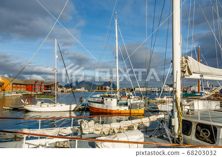 Yachts and boats with mountain in the background Yachts and boats with mountain in the background 68203032