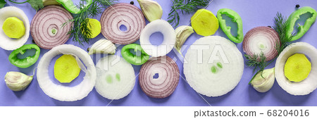 Onion rings on blue background Onion rings on blue background 68204016
