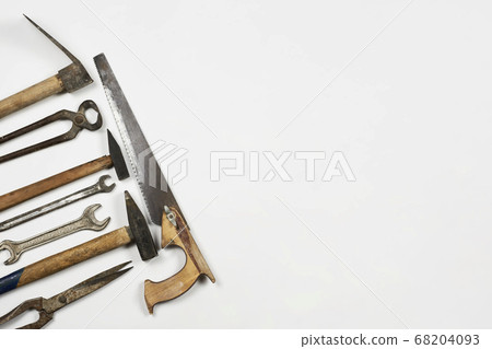 Old and rustic handy working tools on the white background Old and rustic handy working tools on the white background 68204093