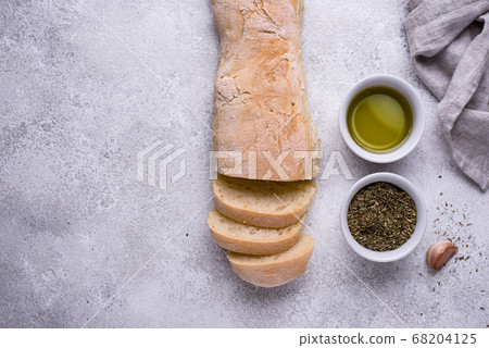 Homemade French baguettes with olive oil Homemade French baguettes with olive oil 68204125