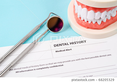 Dental history form with model tooth and dental 68205329