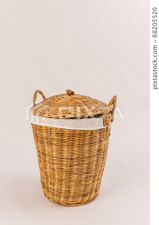 wicker basket for dirty laundry white background isolated wicker basket for dirty laundry white background isolated 68205520