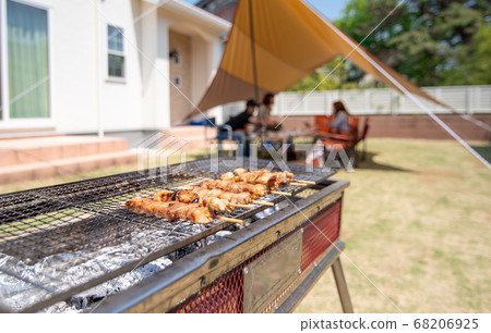 Barbecue in the home garden 68206925