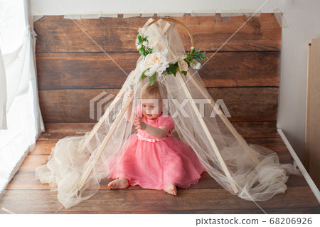 One year old baby celebrates birthday. One year old baby celebrates birthday. 68206926