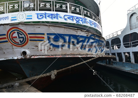 A long-distance ship, which has been suspended in Dhaka Shodorgat, the capital of Bangladesh, with a retro hull and guest rooms A long-distance ship, which has been suspended in Dhaka Shodorgat, the capital of Bangladesh, with a retro hull and guest rooms 68208487