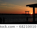 Torii and the sunset by the lake 68210010