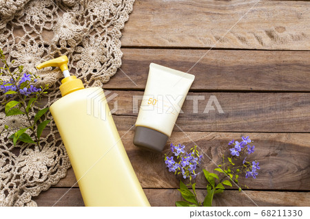 natural cosmetics for skin face sunscreen spf50 ,crochet ,body lotion and purple flowers of lifestyle woman natural cosmetics for skin face sunscreen spf50 ,crochet ,body lotion and purple flowers of lifestyle woman 68211330