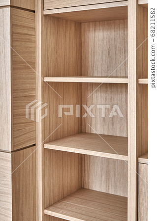 Wooden bookshelves. Wooden bookcases and wall panels made of oak veneered MDF 68211582