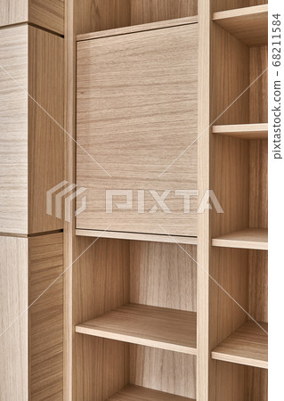 Wooden bookshelves. Wooden bookcases and wall panels made of oak veneered MDF 68211584