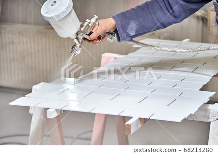 Painting furniture in a spray booth. Furniture manufacturing 68213280