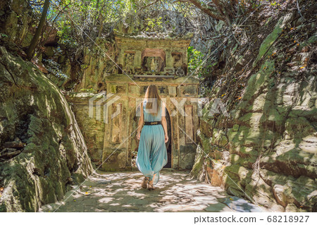 Woman tourist on the background of Beautiful Marble mountains and Da Nang, Vietnam 68218927