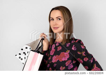 Fashion portrait of pretty woman in floral dress 68220804