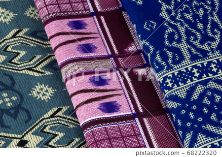 Colourful Malaysian Sarongs Neatly Folded Colourful Malaysian Sarongs Neatly Folded 68222320