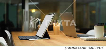 Laptop and digital tablet with keyboard on wooden 68223974