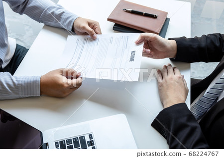 Businessman interview consider a resume 68224767