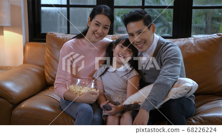 Family concept. An Asian family is watching Family concept. An Asian family is watching 68226224