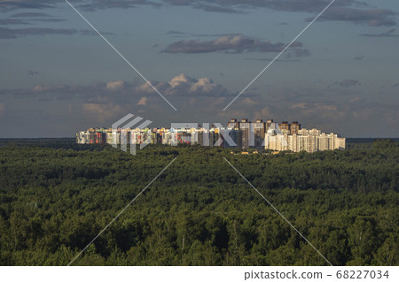 New high-rise buildings on a green hill. New high-rise buildings on a green hill. 68227034