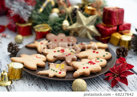 Presenting traditional gingerbread cookies with ornaments for christmas celebration 68227642