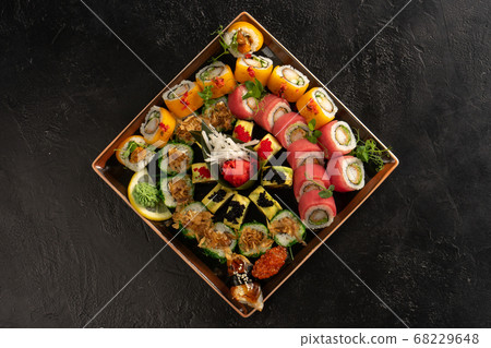 Sushi set with different types of rolls and Sushi set with different types of rolls and 68229648