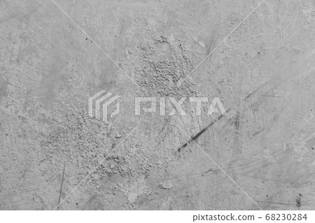 Close-up of White cement wall peeled paint caused by water and sunlight. Peel wall of White house paint with black stain. Black and White of Texture background. Close-up of White cement wall peeled paint caused by water and sunlight. Peel wall of White house paint with black stain. Black and White of Texture background. 68230284