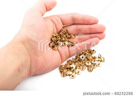 Close-up of a brass screw rivet, for electronics, 68232298