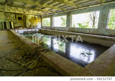 Abandoned school swimming pool in ghost town Abandoned school swimming pool in ghost town 68232787