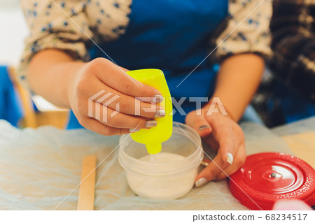 Ingredient for make home made Toy Called Slime, Teenager having fun and being creative homemade slime. Selective focus on Slime. Ingredient for make home made Toy Called Slime, Teenager having fun and being creative homemade slime. Selective focus on Slime. 68234517