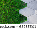 grass and tiles close-up, decorative pattern of the floor in the garden 68235501