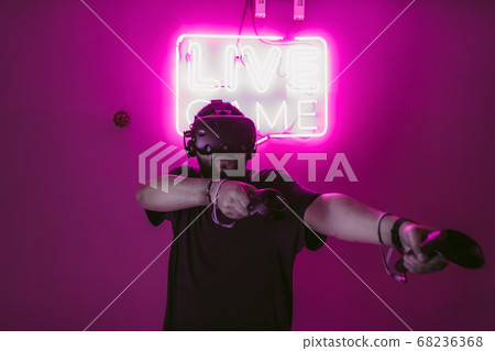 Live games in virtual reality. The guy in the game outfit. Live games in virtual reality. The guy in the game outfit. 68236368